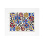 Colourful print featuring a floral pattern, mounted in white.